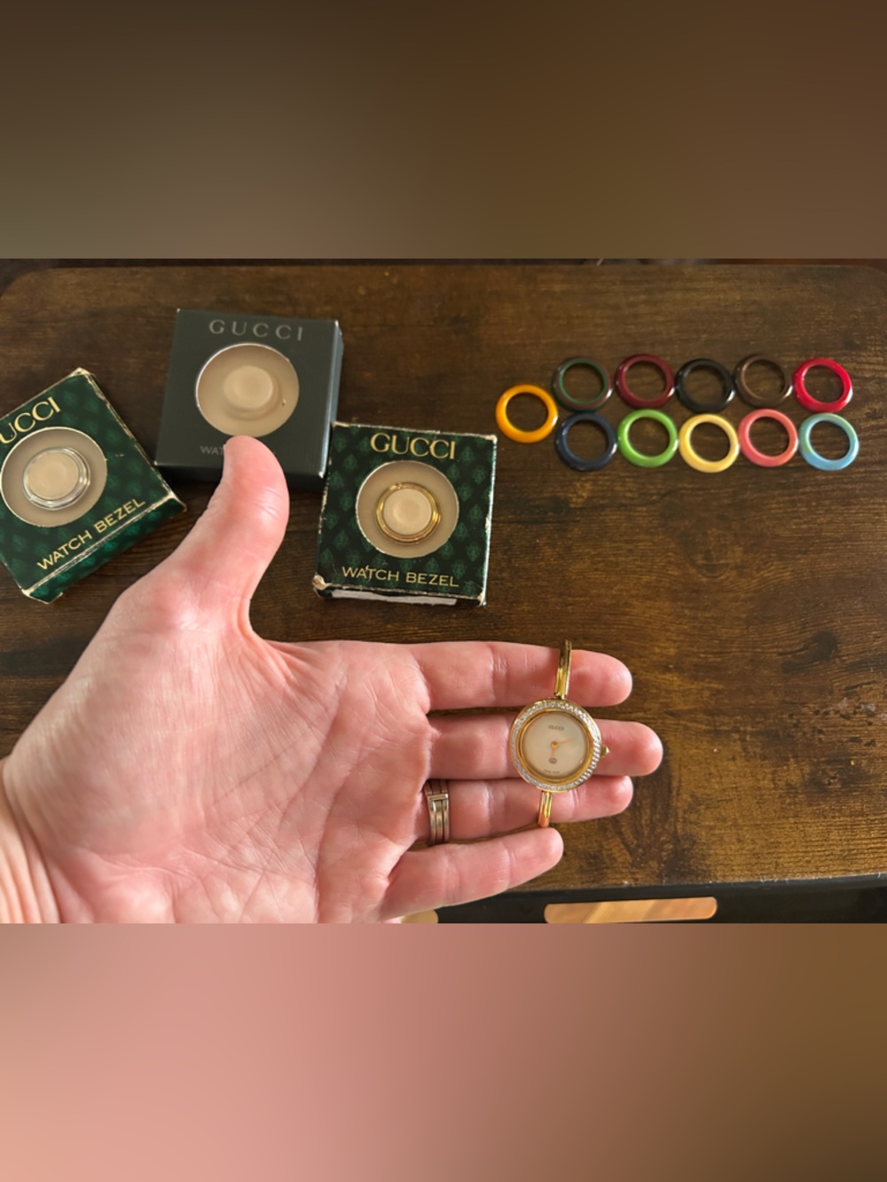 Gucci Gold Bangle Watch with Assorted Colored Interchangeable Bezels